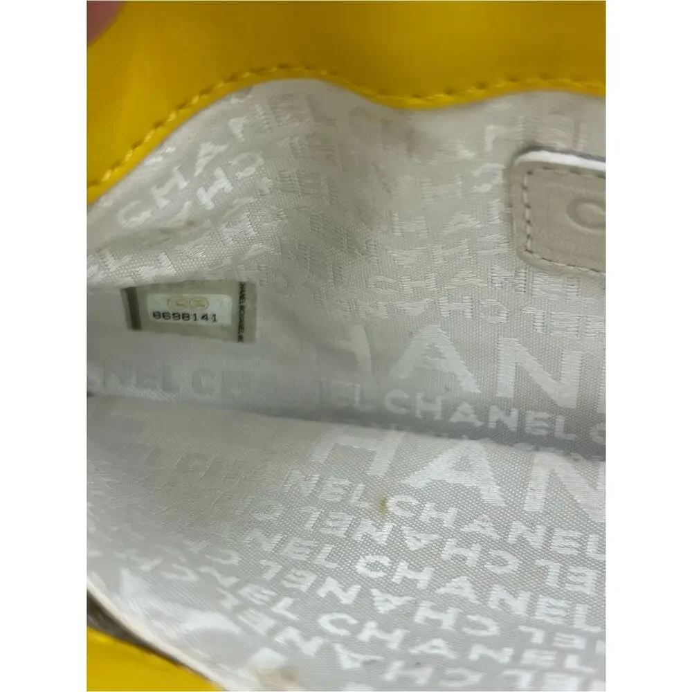 Women's Chanel patent leather floral embossed shoulder bag made in Italy